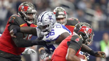 ARLINGTON, TEXAS - DECEMBER 23: Jameis Winston #3 of the Tampa Bay Buccaneers is sacked by Maliek Collins #96 of the Dallas Cowboys in the second quarter at AT&T Stadium on December 23, 2018 in Arlington, Texas. (Photo by Ronald Martinez/Getty Images)