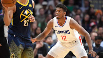 DENVER, CO - FEBRUARY 27: Tyrone Wallace #12 of the LA Clippers defends against the Denver Nuggets at Pepsi Center on February 27, 2018 in Denver, Colorado. NOTE TO USER: User expressly acknowledges and agrees that, by downloading and or using this photograph, User is consenting to the terms and conditions of the Getty Images License Agreement. (Photo by Justin Tafoya/Getty Images)
