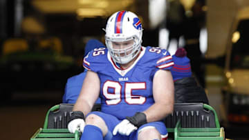 Oct 18, 2015; Orchard Park, NY, USA; Buffalo Bills defensive tackle Kyle Williams (95) is taken off the field after being injured during the second half against the Cincinnati Bengals at Ralph Wilson Stadium. The Bengals beat the Bills 34-21. Mandatory Credit: Kevin Hoffman-USA TODAY Sports