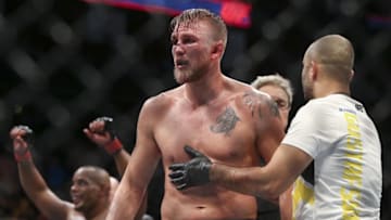 Oct 3, 2015; Houston, TX, USA; Alexander Gustafsson (blue gloves) reacts after losing his World Light Heavyweight Championship against Daniel Cormier (red gloves) at UFC 192 at Toyota Center. Mandatory Credit: Troy Taormina-USA TODAY Sports