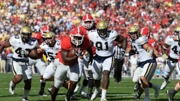 Nov 26, 2016; Athens, GA, USA; Georgia Bulldogs running back Sony Michel (1) runs for a touchdown against the Georgia Tech Yellow Jackets during the first quarter at Sanford Stadium. Mandatory Credit: Dale Zanine-USA TODAY Sports