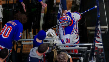 New York Rangers goaltender Henrik Lundqvist (30) high fives fans as he skates off the ice after warmups. Mandatory Credit: Aaron Doster-USA TODAY Sports