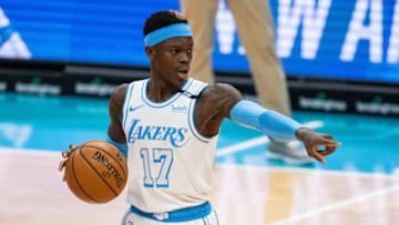 CHARLOTTE, NORTH CAROLINA - APRIL 13: Dennis Schroder #17 of the Los Angeles Lakers brings the ball up court against the Charlotte Hornets in the first half during their game at Spectrum Center on April 13, 2021 in Charlotte, North Carolina. NOTE TO USER: User expressly acknowledges and agrees that, by downloading and or using this photograph, User is consenting to the terms and conditions of the Getty Images License Agreement. (Photo by Jacob Kupferman/Getty Images)