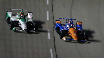 FORT WORTH, TEXAS - JUNE 08: Scott Dixon of New Zealand, driver of the #9 PNC Bank Chip Ganassi Racing Honda, battles Alexander Rossi of the United States, driver of the #27 GESS/Capstone Honda, during the NTT IndyCar Series DXC Technology 600 at Texas Motor Speedway on June 08, 2019 in Fort Worth, Texas. (Photo by Brian Lawdermilk/Getty Images)