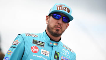 BROOKLYN, MICHIGAN - JUNE 10: Kyle Busch, driver of the #18 M&M's Hazelnut Toyota, walks to his car on pit road during the Monster Energy NASCAR Cup Series FireKeepers Casino 400 at Michigan International Speedway on June 10, 2019 in Brooklyn, Michigan. (Photo by Logan Riely/Getty Images)