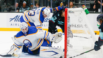 Nov 4, 2021; Seattle, Washington, USA; Buffalo Sabres goaltender Dustin Tokarski (31) makes a save against the Seattle Kraken during the second period at Climate Pledge Arena. Mandatory Credit: Joe Nicholson-USA TODAY Sports
