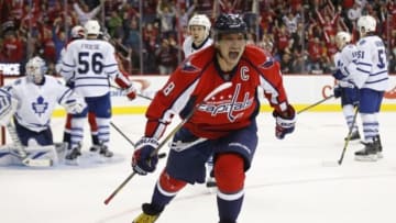 Nov 7, 2015; Washington, DC, USA; Washington Capitals left wing Alex Ovechkin (8) celebrates after scoring a game-tying goal against Toronto Maple Leafs goalie James Reimer (34) in the closing minutes of the third period at Verizon Center. The goal was waved off on a coach's challenge, and the Capitals won 3-2 in a shootout. Mandatory Credit: Geoff Burke-USA TODAY Sports