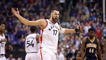 Apr 18, 2016; Toronto, Ontario, CAN; Toronto Raptors center Jonas Valanciunas (17) celebrates after making a basket against the Indiana Pacers in game two of the first round of the 2016 NBA Playoffs at Air Canada Centre. Mandatory Credit: Tom Szczerbowski-USA TODAY Sports