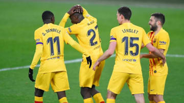 Barcelona's Spanish midfielder Ilaix Moriba (2L) celebrates with Barcelona's French forward Ousmane Dembele, Barcelona's French defender Clement Lenglet and Barcelona's Spanish defender Jordi Alba. (Photo by ANDER GILLENEA/AFP via Getty Images)