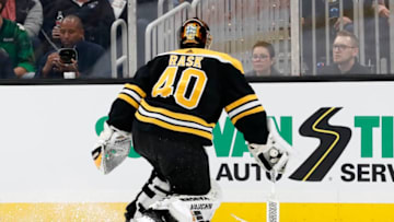 BOSTON, MA - OCTOBER 22: Boston Bruins goalie Tuukka Rask (40) chases the puck to the boards during a game between the Boston Bruins and the Toronto Maple Leafs on October 22, 2019, at TD Garden in Boston, Massachusetts. (Photo by Fred Kfoury III/Icon Sportswire via Getty Images)
