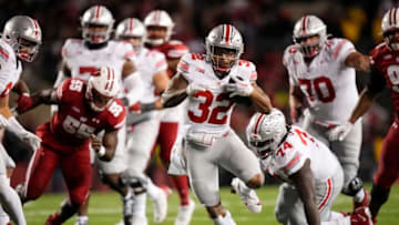 Oct 28, 2023; Madison, Wisconsin, USA; Ohio State Buckeyes running back TreVeyon Henderson (32) runs for a 33-yard touchown during the second half of the NCAA football game against the Wisconsin Badgers at Camp Randall Stadium. Ohio State won 24-10.
