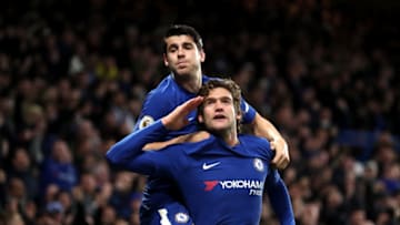 Chelsea's Marcos Alonso celebrates scoring his side's second goal of the game with Alvaro Morata (top) during the Premier League match at Stamford Bridge, London. (Photo by Adam Davy/PA Images via Getty Images)