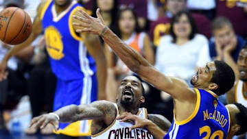 Jun 10, 2016; Cleveland, OH, USA; Cleveland Cavaliers guard J.R. Smith (5) and Golden State Warriors forward James Michael McAdoo (20) go after a rebound during the second quarter in game four of the NBA Finals at Quicken Loans Arena. Mandatory Credit: Bob Donnan-USA TODAY Sports