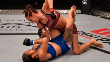 LAS VEGAS, NV - JUNE 26: (R-L) Antonina Shevchenko of Kyrgyzstan punches Jaimee Nievera in their women's flyweight bout during Dana White's Tuesday Night Contender Series at the TUF Gym on June 26, 2018 in Las Vegas, Nevada. (Photo by Jeff Bottari/DWTNCS LLC)