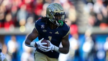 Nov 27, 2021; Atlanta, Georgia, USA; Georgia Tech Yellow Jackets running back Jahmyr Gibbs (1) runs the ball against the Georgia Bulldogs in the first quarter at Bobby Dodd Stadium. Mandatory Credit: Brett Davis-USA TODAY Sports