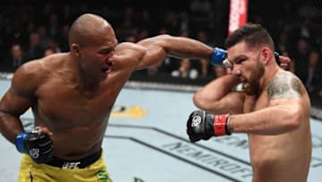 NEW YORK, NY - NOVEMBER 03: (L-R) Ronaldo Souza of Brazil punches Chris Weidman in their middleweight bout during the UFC 230 event inside Madison Square Garden on November 3, 2018 in New York, New York. (Photo by Jeff Bottari/Zuffa LLC/Zuffa LLC via Getty Images)