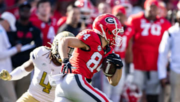 ATHENS, GA - NOVEMBER 26: Ladd McConkey #84 of the Georgia Bulldogs runs with the ball during a game between Georgia Tech Yellow Jackets and Georgia Bulldogs at Sanford Stadium on November 26, 2022 in Athens, Georgia. (Photo by Steve Limentani/ISI Photos/Getty Images)