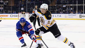 NEW YORK, NEW YORK - SEPTEMBER 28: Trent Frederic #11 of the Boston Bruins takes the third period shot against the New York Rangers in a preseason game at Madison Square Garden on September 28, 2021 in New York City. The Rangers defeated the Bruins 3-2. (Photo by Bruce Bennett/Getty Images)