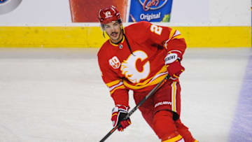 CALGARY, AB - OCTOBER 05: Travis Hamonic #24 of the Calgary Flames in action against the Vancouver Canucks during an NHL game at Scotiabank Saddledome on October 5, 2019 in Calgary, Alberta, Canada. (Photo by Derek Leung/Getty Images)