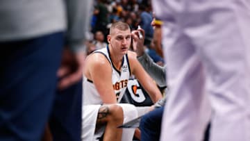 Oct 25, 2021; Denver, Colorado, USA; Denver Nuggets center Nikola Jokic (15) looks on during a timeout in the second quarter against the Cleveland Cavaliers at Ball Arena. Mandatory Credit: Isaiah J. Downing-USA TODAY Sports