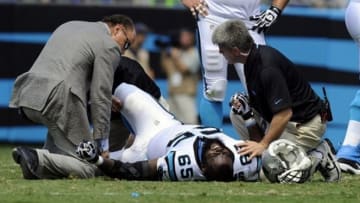 Sep 8, 2013; Charlotte, NC, USA; Carolina Panthers tackle Garry Willimas (65) is hurt during the game against the Seattle Seahawks at Bank of America Stadium. Mandatory Credit: Sam Sharpe-USA TODAY Sports