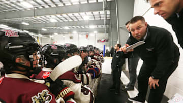 PETERBOROUGH, ON - OCTOBER 23: Former Boston Bruins player Marc Savard talks to players on the bench at the Evinrude Centre in Peterborough, Ontario on Oct. 23, 2016. The two-time All-Star had his professional playing career cut short by concussions and now coaches the Peterborough Evinrude Blades minor bantam AAA Petes. (Photo by Stan Grossfeld/The Boston Globe via Getty Images)