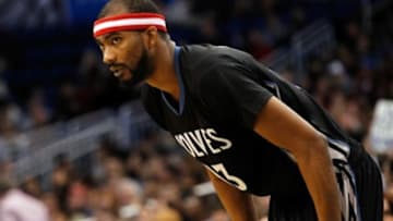 Nov 7, 2014; Orlando, FL, USA; Minnesota Timberwolves guard Corey Brewer (13) against the Orlando Magic during the second half at Amway Center. Orlando Magic defeated the Minnesota Timberwolves 112-103 in overtime. Mandatory Credit: Kim Klement-USA TODAY Sports