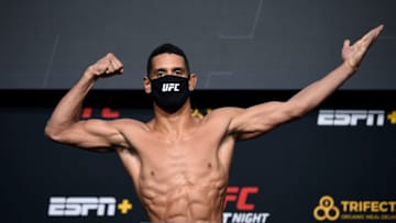 LAS VEGAS, NEVADA - NOVEMBER 27: In this handout image provided by the UFC, Miguel Baeza poses on the scale during the UFC weigh-in at UFC APEX on November 27, 2020 in Las Vegas, Nevada. (Photo by Chris Unger/Zuffa LLC via Getty Images)