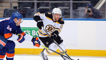 ELMONT, NEW YORK - DECEMBER 16: Taylor Hall #71 of the Boston Bruins skates against the New York Islanders at the UBS Arena on December 16, 2021 in Elmont, New York. (Photo by Bruce Bennett/Getty Images)