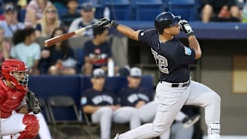 Mar 23, 2016; Melbourne, FL, USA; New York Yankees catcher Gary Sanchez (72) hits a fly ball in the ninth inning against the Washington Nationals at Space Coast Stadium. The Washington Nationals won 13-0. Mandatory Credit: Logan Bowles-USA TODAY Sports
