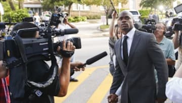 Oct 8, 2014; Conroe, TX, USA; Minnesota Vikings running back Adrian Peterson enters the Montgomery county courthouse for his arraignment. Mandatory Credit: Kevin Jairaj-USA TODAY Sports