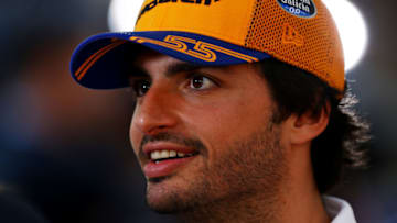 ABU DHABI, UNITED ARAB EMIRATES - NOVEMBER 28: Carlos Sainz of Spain and McLaren F1 talks to the media in the Paddock during previews ahead of the F1 Grand Prix of Abu Dhabi at Yas Marina Circuit on November 28, 2019 in Abu Dhabi, United Arab Emirates. (Photo by Francois Nel/Getty Images)