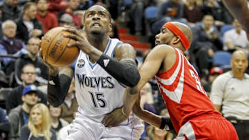 Apr 11, 2016; Minneapolis, MN, USA; Minnesota Timberwolves forward Shabazz Muhammad (15) drives to the basket around Houston Rockets guard Corey Brewer (33) in the fourth quarter at Target Center. The Rockets win 129-105. Mandatory Credit: Bruce Kluckhohn-USA TODAY Sports