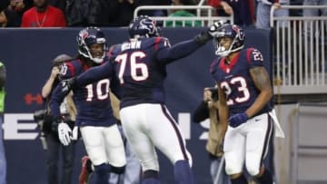 Dec 28, 2014; Houston, TX, USA; Houston Texans running back Arian Foster (23) celebrates a touchdown with teammates during the first quarter against the Jacksonville Jaguars at NRG Stadium. Mandatory Credit: Kevin Jairaj-USA TODAY Sports
