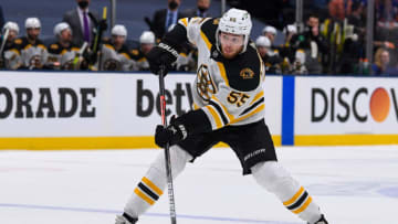 Jun 5, 2021; Uniondale, New York, USA; Boston Bruins defenseman Jeremy Lauzon (55) shoots the puck against the New York Islanders during the third period in game four of the second round of the 2021 Stanley Cup Playoffs at Nassau Veterans Memorial Coliseum. Mandatory Credit: Dennis Schneidler-USA TODAY Sports