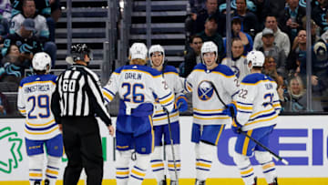 SEATTLE, WASHINGTON - OCTOBER 25: Dylan Cozens #24 of the Buffalo Sabres celebrates his goal against the Seattle Kraken during the second period at Climate Pledge Arena on October 25, 2022 in Seattle, Washington. (Photo by Steph Chambers/Getty Images)