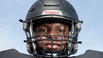 Lake Cormorant defensive lineman Kamarion Franklin stands on his high school’s football field Wednesday, July 27, 2022, at Lake Cormorant High School in Lake Cormorant, Miss.