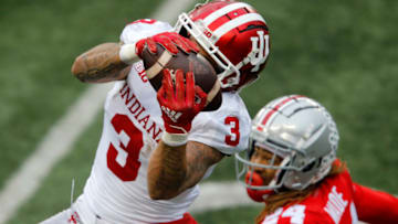 Nov 21, 2020; Columbus, Ohio, USA; Indiana Hoosiers wide receiver Ty Fryfogle (3)makes the catch over Ohio State Buckeyes cornerback Shaun Wade (24) and eventually scored on the play during the third quarter at Ohio Stadium. Mandatory Credit: Joseph Maiorana-USA TODAY Sports