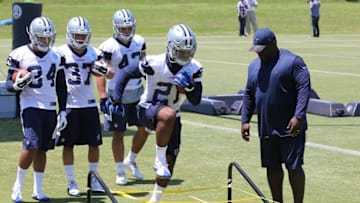 May 6, 2016; Irving, TX, USA; Dallas Cowboys number one draft pick Ezekiel Elliott (21) runs drills under instructions from running back coach Gary Brown during rookie minicamp at Dallas Cowboys headquarters at Valley Ranch. Mandatory Credit: Matthew Emmons-USA TODAY Sports