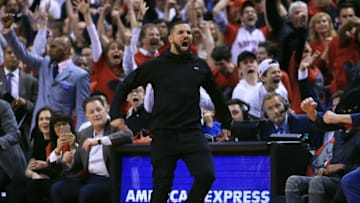 TORONTO, ON - APRIL 26: Singer Drake celebrates after Terrance Ross
