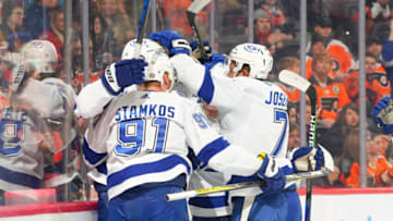 PHILADELPHIA, PA - DECEMBER 05: Steven Stamkos #91 and Mathieu Joseph #7 of the Tampa Bay Lightning celebrate after a goal by Ryan McDonagh #27 (not pictured) against the Philadelphia Flyers in the first period at the Wells Fargo Center on December 5, 2021 in Philadelphia, Pennsylvania. (Photo by Mitchell Leff/Getty Images)