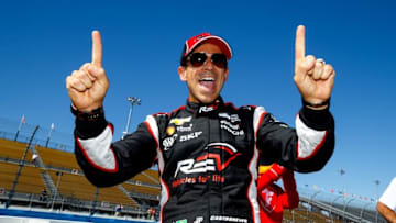 Apr 1, 2016; Avondale, AZ, USA; Verizon IndyCar Series driver Helio Castroneves celebrates after winning the pole position with a track record during qualifying for the Phoenix Grand Prix at Phoenix International Raceway. Mandatory Credit: Mark J. Rebilas-USA TODAY Sports