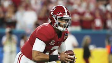 MIAMI, FL - DECEMBER 29: Jalen Hurts #2 of the Alabama Crimson Tide carries the ball in the second quarter during the College Football Playoff Semifinal against the Oklahoma Sooners at the Capital One Orange Bowl at Hard Rock Stadium on December 29, 2018 in Miami, Florida. (Photo by Streeter Lecka/Getty Images)