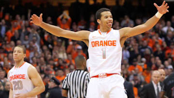 SYRACUSE, NY - JANUARY 21: Michael Carter-Williams #1 of the Syracuse Orange celebrates after a play during the game against the Cincinnati Bearcats at the Carrier Dome on January 21, 2013 in Syracuse, New York. (Photo by Nate Shron/Getty Images)