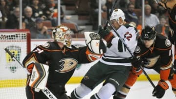 October 17, 2014; Anaheim, CA, USA; Anaheim Ducks goalie Frederik Andersen (31) blocks a shot as center Ryan Kesler (17) helps defend Minnesota Wild right wing Nino Niederreiter (22) during the first period at Honda Center. Mandatory Credit: Gary A. Vasquez-USA TODAY Sports