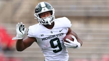 PISCATAWAY, NJ - OCTOBER 09 : Kenneth Walker III #9 of the Michigan State Spartans runs against the Rutgers Scarlet Knights during a game at SHI Stadium on October 9, 2021 in Piscataway, New Jersey. Michigan State defeated Rutgers 31-13. (Photo by Rich Schultz/Getty Images)