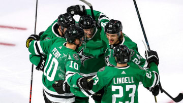 EDMONTON, ALBERTA - AUGUST 30: Roope Hintz #24 of the Dallas Stars is congratulated by his teammates after scoring a goal against the Colorado Avalanche during the third period in Game Four of the Western Conference Second Round during the 2020 NHL Stanley Cup Playoffs at Rogers Place on August 30, 2020 in Edmonton, Alberta, Canada. (Photo by Bruce Bennett/Getty Images)