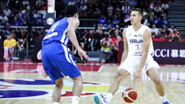 FOSHAN, CHINA - SEPTEMBER 02: #7 Bogdan Bogdanovic of the Serbia National Team in action against #18 Troy Rosario of the Philippines National Team during the 1st round of 2019 FIBA World Cup at GBA International Sports and Cultural Center on September 02, 2019 in Foshan, China. (Photo by Zhong Zhi/Getty Images)