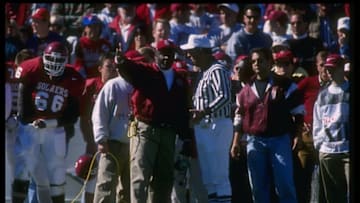 2 Nov 1996: Oklahoma Sooners head coach John Blake confers with an official during a game against the Nebraska Cornhuskers at Memorial Stadium in Norman, Oklahoma. Nebraska won the game, 73-21.