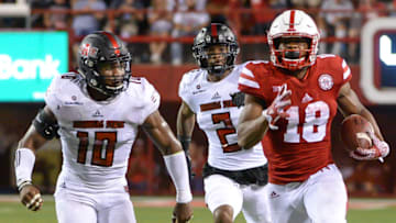 LINCOLN, NE - SEPTEMBER 02: Running back Tre Bryant #18 of the Nebraska Cornhuskers runs from defensive back Justin Clifton #10 and defensive back Nehemiah Wagner #2 of the Arkansas State Red Wolves at Memorial Stadium on September 2, 2017 in Lincoln, Nebraska. (Photo by Steven Branscombe/Getty Images)